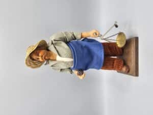 Man met weegschaal Michel Girault